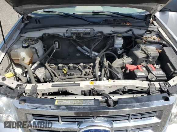 2011 Ford Escape XLS z VIN 1FMCU0C75BKA71501, wystawiony jako Copart lot #62614335 z przebiegiem 130 210 mil mil oraz Szkoda całkowita • Salvage title. Historia ofert i sprzedaży dostępna na DreamBid. Obrazek 11.