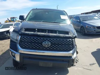 2018 Toyota Tundra SR5 z VIN 5TFDW5F12JX694518, wystawiony jako IAAI lot #41663831 z przebiegiem 183 220 mil mil oraz . Historia ofert i sprzedaży dostępna na DreamBid. Obrazek 13.