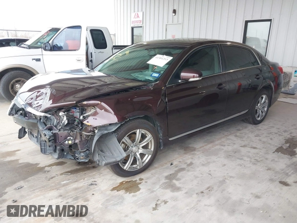 2012 Toyota Avalon with VIN 4T1BK3DB7CU463729, listed as a IAAI auction lot 41301213 with 59,923 mi miles. Bid and sale history available at carsss.com. Image 2.