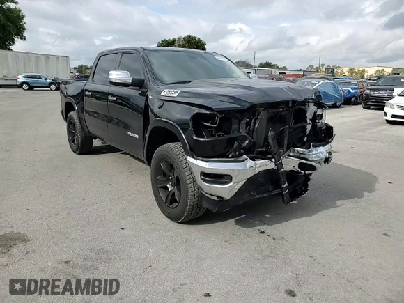 2022 Ram 1500 Laramie with VIN 1C6SRFJT4NN300006, listed as a Copart auction lot 54976775 with 61,436 mi miles and Salvage title. Bid and sale history available at DreamBid. Image 14.