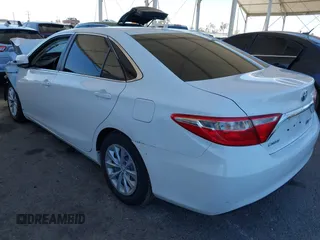 2017 Toyota Camry Hybrid LE with VIN 4T1BD1FKXHU206891, listed as a IAAI auction lot 41839609 with 142,744 mi miles. Bid and sale history available at carsss.com. Image 3.