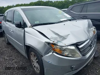 2012 Honda Odyssey EX-L with VIN 5FNRL5H67CB091200, listed as a IAAI auction lot 42611120 with 178,002 mi miles and . Bid and sale history available at DreamBid. Image 1.