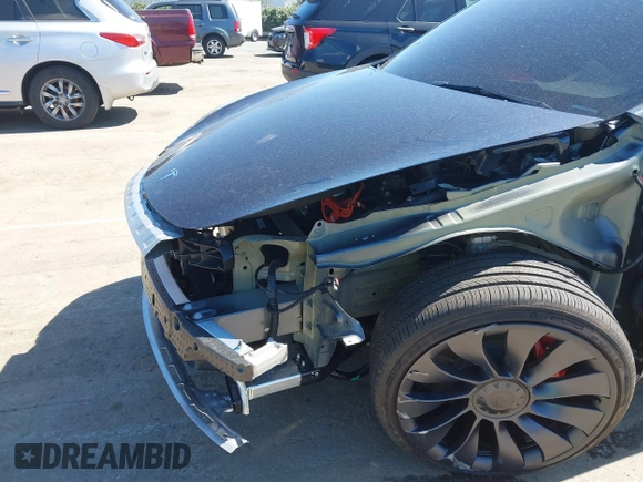 2024 Tesla Model Y Performance with VIN 7SAYGDEF1RA329825, listed as a IAAI auction lot 41762602 with 3,923 mi miles and . Bid and sale history available at DreamBid. Image 20.