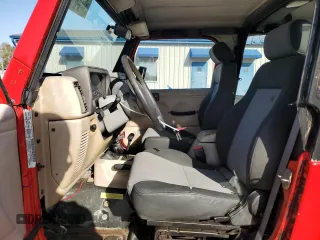 1999 Jeep Wrangler Sport with VIN 1J4FY19SXXP415934, listed as a Copart auction lot 47881675 with 184,876 mi miles and Salvage Title. Bid and sale history available at carsss.com. Image 7.