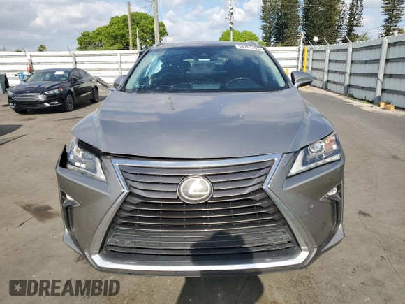 2018 Lexus RX 350 z VIN 2T2ZZMCA6JC097202, wystawiony jako Copart lot #54763105 z przebiegiem 113 011 mil mil oraz Szkoda całkowita • Salvage title. Historia ofert i sprzedaży dostępna na DreamBid. Obrazek 5.