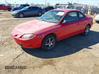 2001 Ford Escort ZX2 with VIN 3FAFP11381R123590, listed as a IAAI auction lot 41877802 with 190,747 mi miles. Bid and sale history available at carsss.com. Image 2.