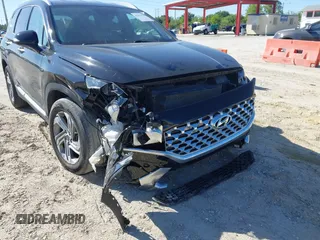 2022 Hyundai Santa Fe XRT z VIN 5NMS64AJXNH427005, wystawiony jako IAAI lot #41825727 z przebiegiem 35 435 mil mil oraz . Historia ofert i sprzedaży dostępna na DreamBid. Obrazek 6.