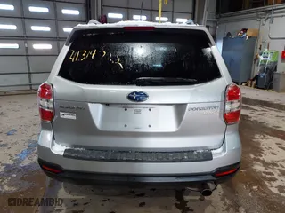 2015 Subaru Forester 2.5i Touring with VIN JF2SJAUCXFH471892, listed as a IAAI auction lot 41314722 with 94,717 mi miles. Bid and sale history available at carsss.com. Image 16.
