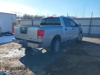 2011 Nissan Titan Pro-4X with VIN 1N6BA0EC8BN304544, listed as a IAAI auction lot 41329674 with 235,319 mi miles and . Bid and sale history available at DreamBid. Image 4.