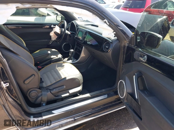 2018 Volkswagen Beetle Dune with VIN 3VWSD7AT1JM702354, listed as a IAAI auction lot 41993527 with 50,952 mi miles and . Bid and sale history available at DreamBid. Image 5.