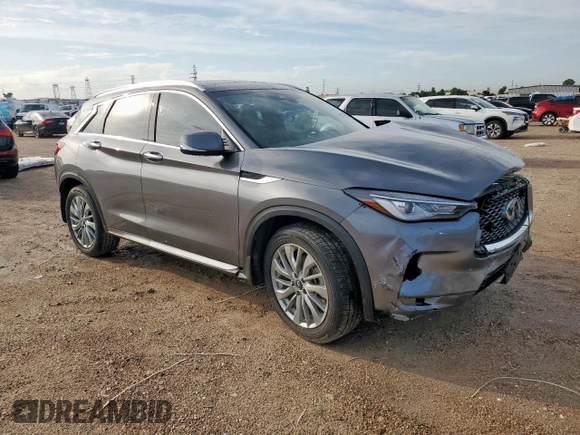 2023 Infiniti QX50 Luxe z VIN 3PCAJ5BA3PF105275, wystawiony jako Copart lot #61144205 z przebiegiem 26 399 mil mil oraz Szkoda całkowita • Salvage title. Historia ofert i sprzedaży dostępna na DreamBid. Obrazek 4.