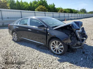 2016 Cadillac XTS Luxury Collection with VIN 2G61N5S39G9134633, listed as a Copart auction lot 57592715 with Not provided miles and Salvage title. Bid and sale history available at DreamBid. Image 4.