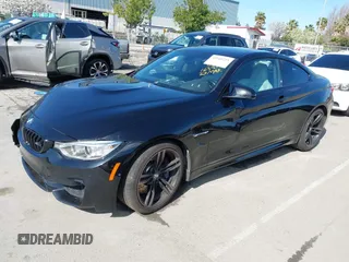 2015 BMW M4 with VIN WBS3R9C58FK334247, listed as a IAAI auction lot 41940211 with 125,881 mi miles. Bid and sale history available at carsss.com. Image 16.