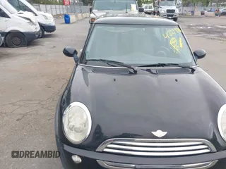 2005 MINI Hardtop with VIN WMWRC33535TJ70850, listed as a IAAI auction lot 42219720 with 66,398 mi miles and . Bid and sale history available at DreamBid. Image 6.