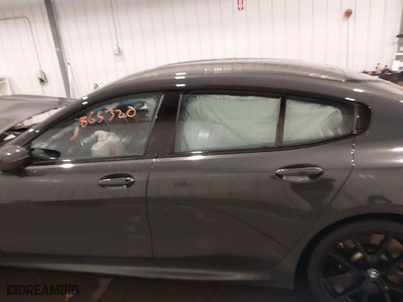2021 BMW 8 Series M850i with VIN WBAGV8C05MCF22170, listed as a IAAI auction lot 38685320 with 1 mi miles. Bid and sale history available at carsss.com. Image 14.