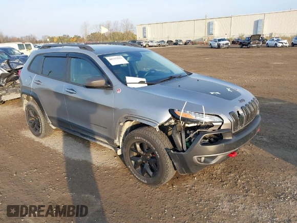 2015 Jeep Cherokee Trailhawk z VIN 1C4PJMBS2FW728961, wystawiony jako IAAI lot #40712830 z przebiegiem 79 299 mil mil oraz . Historia ofert i sprzedaży dostępna na DreamBid. Obrazek 1.