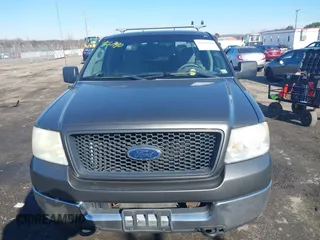 2005 Ford F-150 STX with VIN 1FTRX14W95NB07100, listed as a IAAI auction lot 41627990 with 381,000 mi miles. Bid and sale history available at carsss.com. Image 12.
