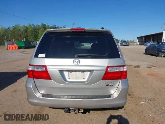 2005 Honda Odyssey EX-L z VIN 5FNRL38715B014905, wystawiony jako IAAI lot #41986395 z przebiegiem 191 029 mil mil oraz . Historia ofert i sprzedaży dostępna na DreamBid. Obrazek 16.
