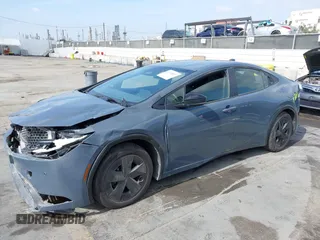 2023 Toyota Prius LE with VIN JTDACAAU0P3013309, listed as a IAAI auction lot 42128527 with 44,473 mi miles. Bid and sale history available at carsss.com. Image 2.