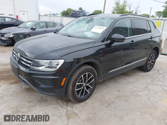 2021 Volkswagen Tiguan SE z VIN 3VV3B7AXXMM101773, wystawiony jako IAAI lot #42358588 z przebiegiem 105 629 mil mil oraz . Historia ofert i sprzedaży dostępna na DreamBid. Obrazek 18.