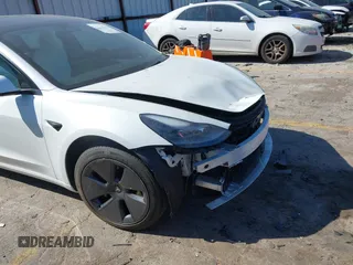 2022 Tesla Model 3 with VIN 5YJ3E1EA7NF103513, listed as a IAAI auction lot 41643592 with 35,631 mi miles and . Bid and sale history available at DreamBid. Image 19.