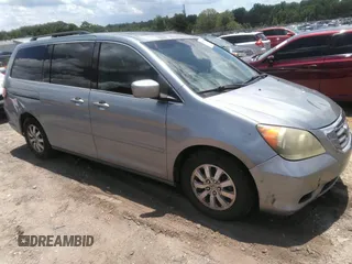 2010 Honda Odyssey EX-L z VIN 5FNRL3H74AB104446, wystawiony jako IAAI lot #42765331 z przebiegiem 319 510 mil mil oraz . Historia ofert i sprzedaży dostępna na DreamBid. Obrazek 1.