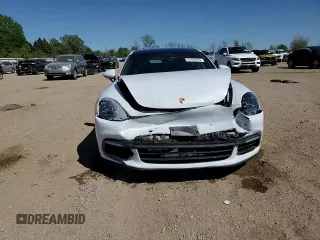2018 Porsche Panamera с VIN WP0AA2A73JL105480, выставлен на аукционе Copart как лот 55964625 с пробегом 28 269 миль миль и Списание • Salvage title. История ставок и продаж доступна на DreamBid. Изображение 13.