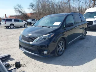 2015 Toyota Sienna SE with VIN 5TDXK3DC9FS652765, listed as a IAAI auction lot 41723922 with 105,679 mi miles. Bid and sale history available at carsss.com. Image 20.