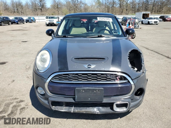 2014 MINI Hardtop S with VIN WMWXM7C54ET985344, listed as a Copart auction lot 55242945 with 87,017 mi miles and Salvage Title. Bid and sale history available at DreamBid. Image 5.