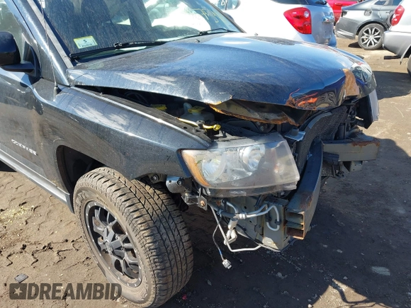 2014 Jeep Compass Latitude with VIN 1C4NJDEB2ED626380, listed as a IAAI auction lot 41675908 with 90,153 mi miles. Bid and sale history available at carsss.com. Image 6.