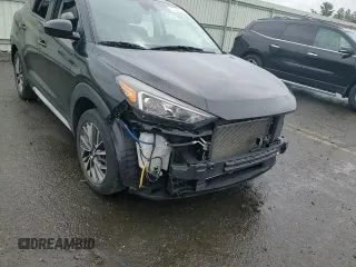 2019 Hyundai Tucson SEL z VIN KM8J3CAL1KU056591, wystawiony jako Copart lot #56721945 z przebiegiem 60 303 mil mil oraz Szkoda całkowita • Salvage title. Historia ofert i sprzedaży dostępna na DreamBid. Obrazek 14.