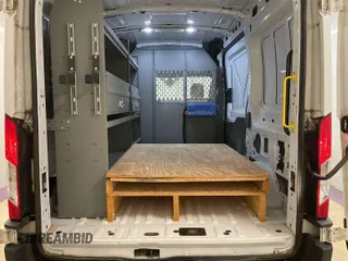 2021 Ford Transit Cargo with VIN 1FTBR1CG4MKA80751, listed as a IAAI auction lot 42859733 with 80,844 mi miles and . Bid and sale history available at DreamBid. Image 20.