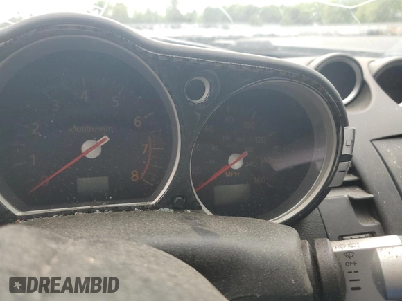 2005 Nissan 350Z Touring z VIN JN1AZ34E05M654954, wystawiony jako Copart lot #57591085 z przebiegiem Nie podano mil oraz Tytuł czysty. Historia ofert i sprzedaży dostępna na DreamBid. Obrazek 9.