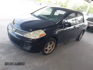 2009 Nissan Versa 1.8 S with VIN 3N1BC11E79L368680, listed as a IAAI auction lot 42090230 with 190,049 mi miles. Bid and sale history available at carsss.com. Image 2.