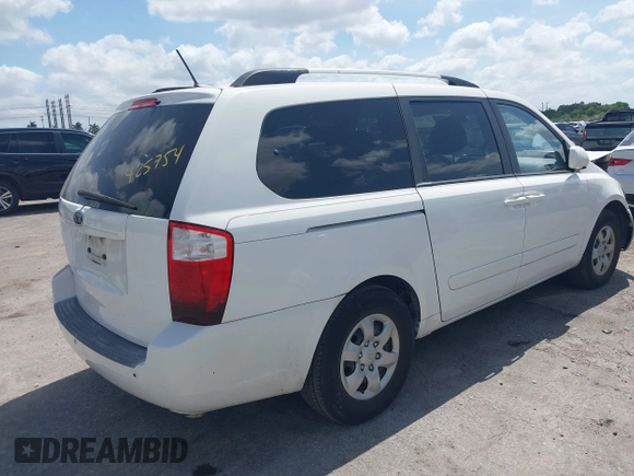 2010 Kia Sedona LX with VIN KNDMG4C33A6338047, listed as a IAAI auction lot 42128485 with 99,498 mi miles and . Bid and sale history available at carsss.com. Image 4.