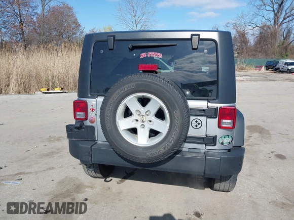 2015 Jeep Wrangler Sport with VIN 1C4GJWAG0FL503254, listed as a IAAI auction lot 41931666 with 115,394 mi miles. Bid and sale history available at carsss.com. Image 16.