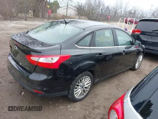 2012 Ford Focus SEL with VIN 1FAHP3H27CL348358, listed as a IAAI auction lot 41967061 with 146,432 mi miles. Bid and sale history available at carsss.com. Image 4.