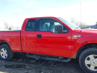 2005 Ford F-150 STX with VIN 1FTRX14W25NA45992, listed as a IAAI auction lot 41702409 with 202,867 mi miles. Bid and sale history available at carsss.com. Image 14.