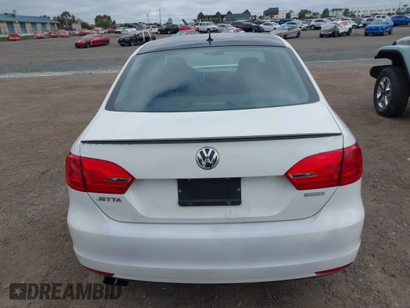 2014 Volkswagen Jetta S with VIN 3VW2K7AJ6EM233000, listed as a IAAI auction lot 41895391 with 130,692 mi miles and . Bid and sale history available at DreamBid. Image 16.