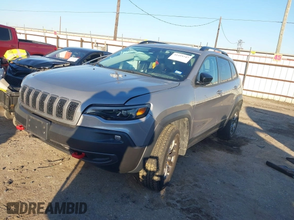 2022 Jeep Cherokee Trailhawk with VIN 1C4PJMBX3ND506936, listed as a IAAI auction lot 41419747 with 26,699 mi miles. Bid and sale history available at carsss.com. Image 2.