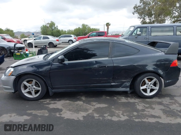 2003 Acura RSX with VIN JH4DC54853C017397, listed as a IAAI auction lot 42179973 with 219,490 mi miles. Bid and sale history available at carsss.com. Image 14.