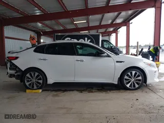 2017 Kia Optima SX with VIN 5XXGW4L2XHG136843, listed as a IAAI auction lot 41806606 with 157,899 mi miles. Bid and sale history available at carsss.com. Image 13.
