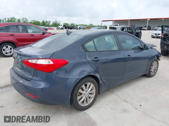 2014 Kia Forte LX with VIN KNAFX4A68E5145665, listed as a IAAI auction lot 42129786 with 192,514 mi miles and . Bid and sale history available at DreamBid. Image 4.