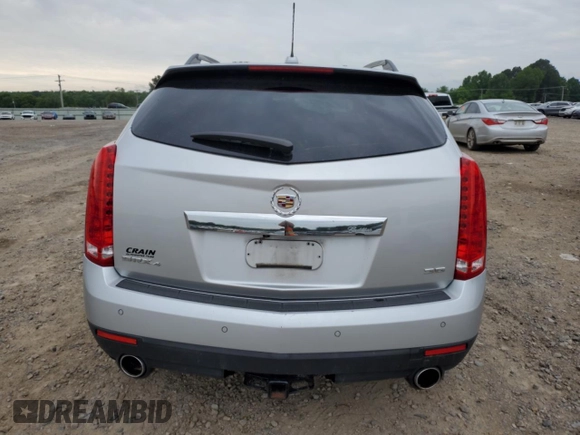 2015 Cadillac SRX Luxury Collection z VIN 3GYFNEE31FS618855, wystawiony jako Copart lot #54868505 z przebiegiem 111 612 mil mil oraz Szkoda całkowita • Salvage title. Historia ofert i sprzedaży dostępna na DreamBid. Obrazek 6.