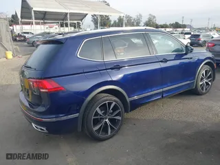 2022 Volkswagen Tiguan SEL R-Line with VIN 3VV4B7AX3NM154238, listed as a IAAI auction lot 40995659 with 23,437 mi miles. Bid and sale history available at carsss.com. Image 4.