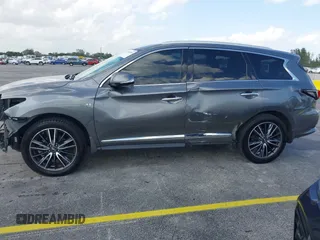 2016 Infiniti QX60 with VIN 5N1AL0MM1GC510760, listed as a IAAI auction lot 41990248 with 60,296 mi miles and . Bid and sale history available at DreamBid. Image 6.