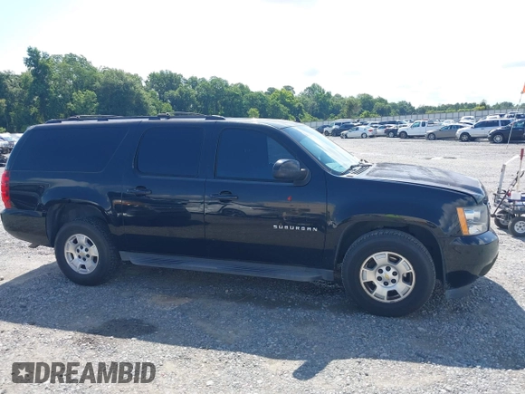 2013 Chevrolet Suburban LT with VIN 1GNSCJE03DR121628, listed as a IAAI auction lot 42629432 with 223,761 mi miles and . Bid and sale history available at DreamBid. Image 13.