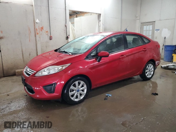 2012 Ford Fiesta SE with VIN 3FADP4BJ1CM147493, listed as a Copart auction lot 51436635 with 166,121 mi miles and Salvage Title. Bid and sale history available at DreamBid. Image 1.