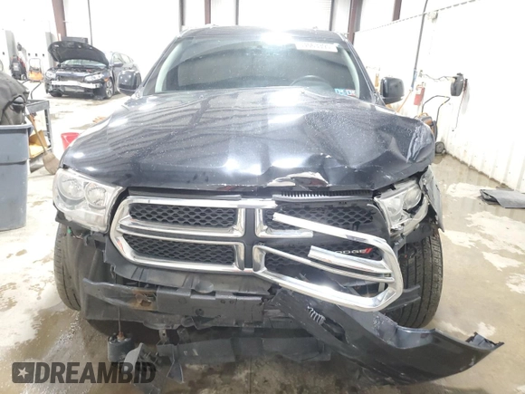 2013 Dodge Durango Crew with VIN 1C4SDJDT8DC509541, listed as a Copart auction lot 54063395 with 145,471 mi miles and Salvage title. Bid and sale history available at DreamBid. Image 5.
