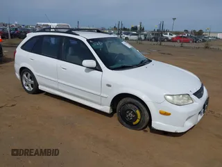 2002 Mazda Protege with VIN JM1BJ245521616216, listed as a IAAI auction lot 41835519 with 179,620 mi miles and . Bid and sale history available at DreamBid. Image 1.